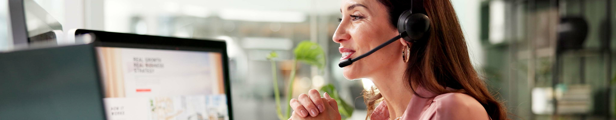 a woman talking using a headset